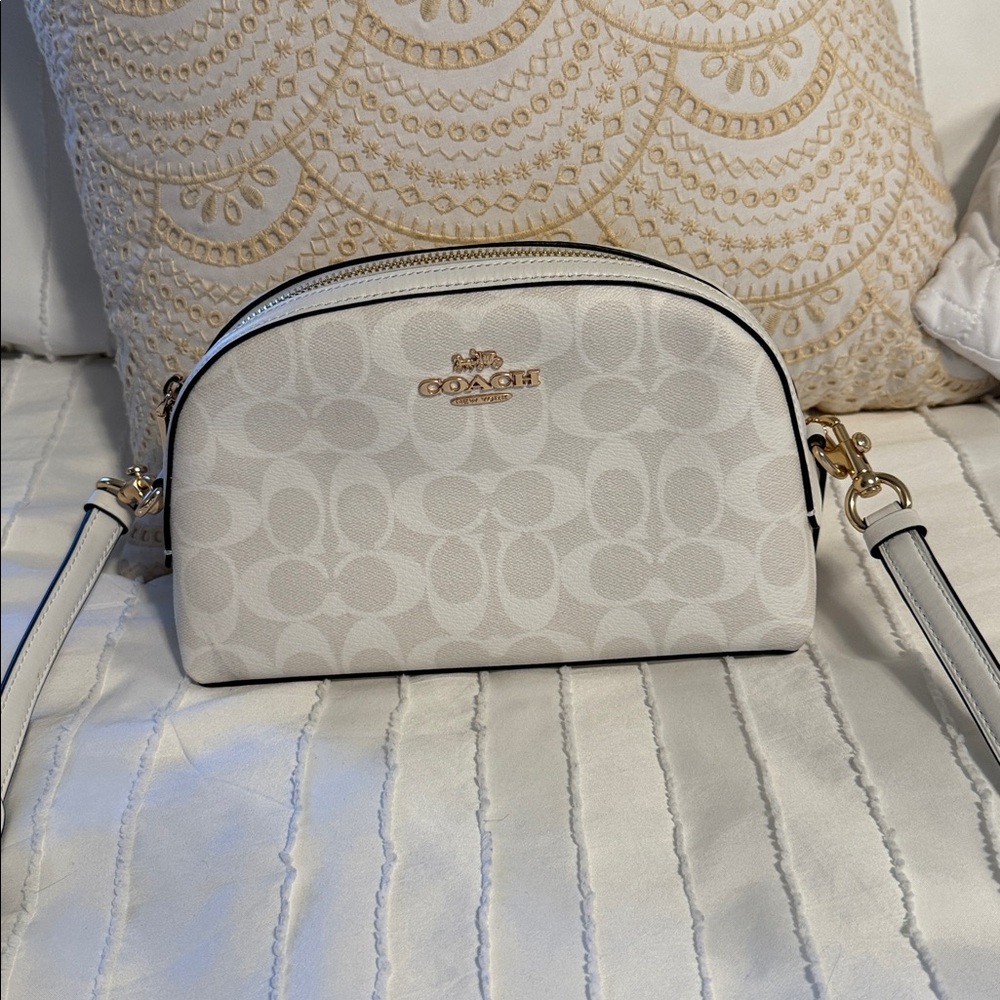 Coach white / Ivory Crossbody Bag with Gold Accents.
